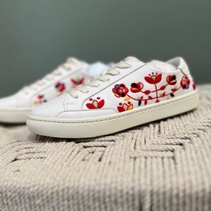 Never worn Soludos white leather sneakers with red embroidered flowers.